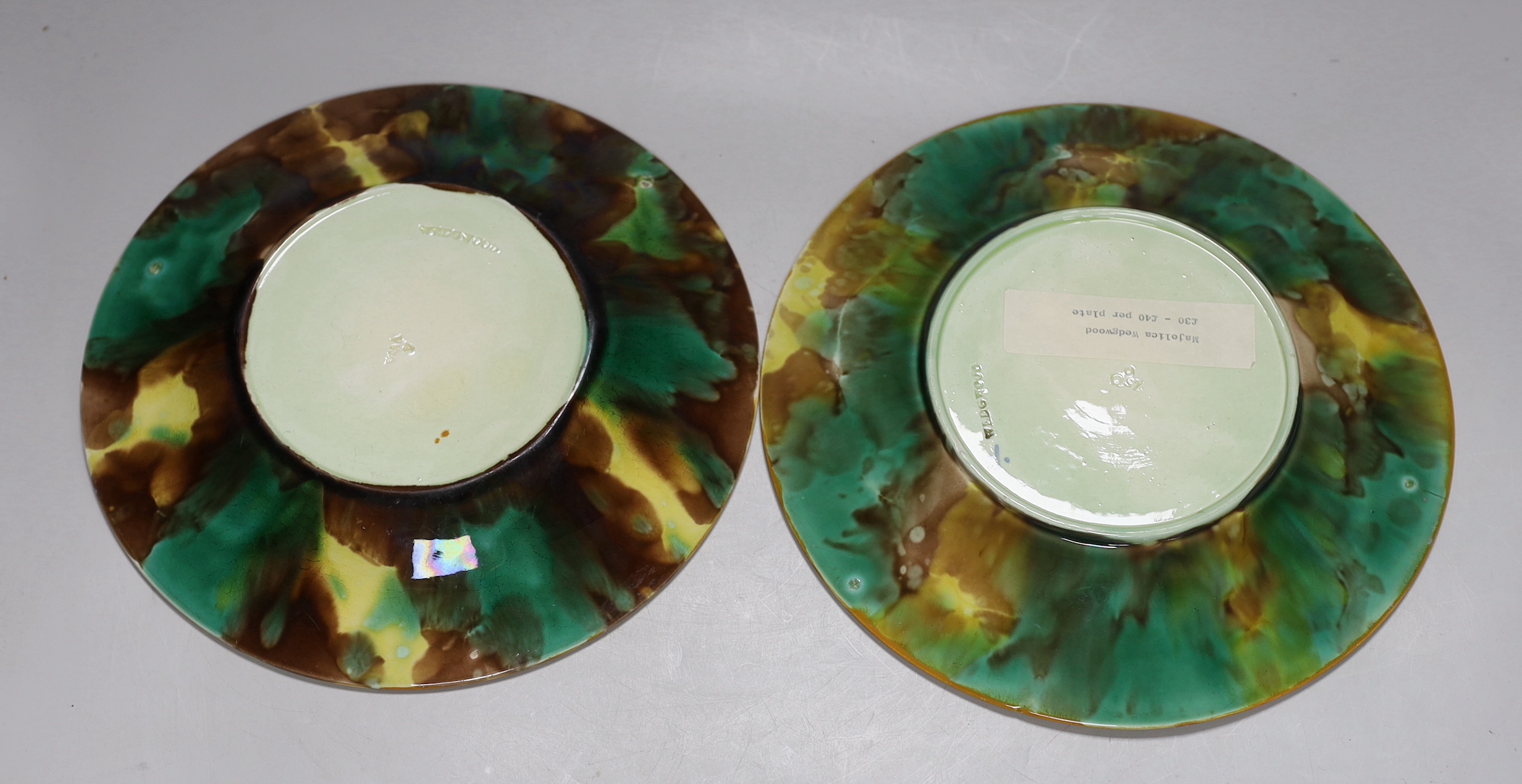 A pair of Wedgwood Majolica plates and a Royal Doulton floral vase painted by Joseph Hancock, 30cm high